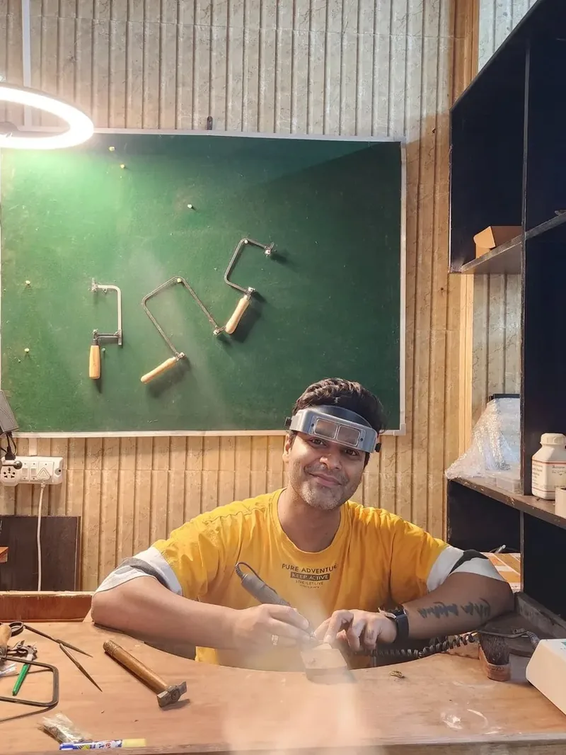 Artisan working at a jewelry bench