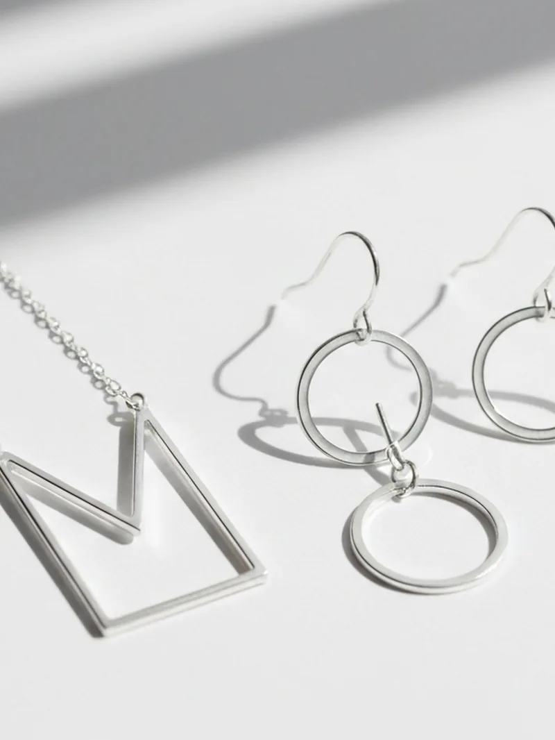 Minimalist silver pendants and earrings